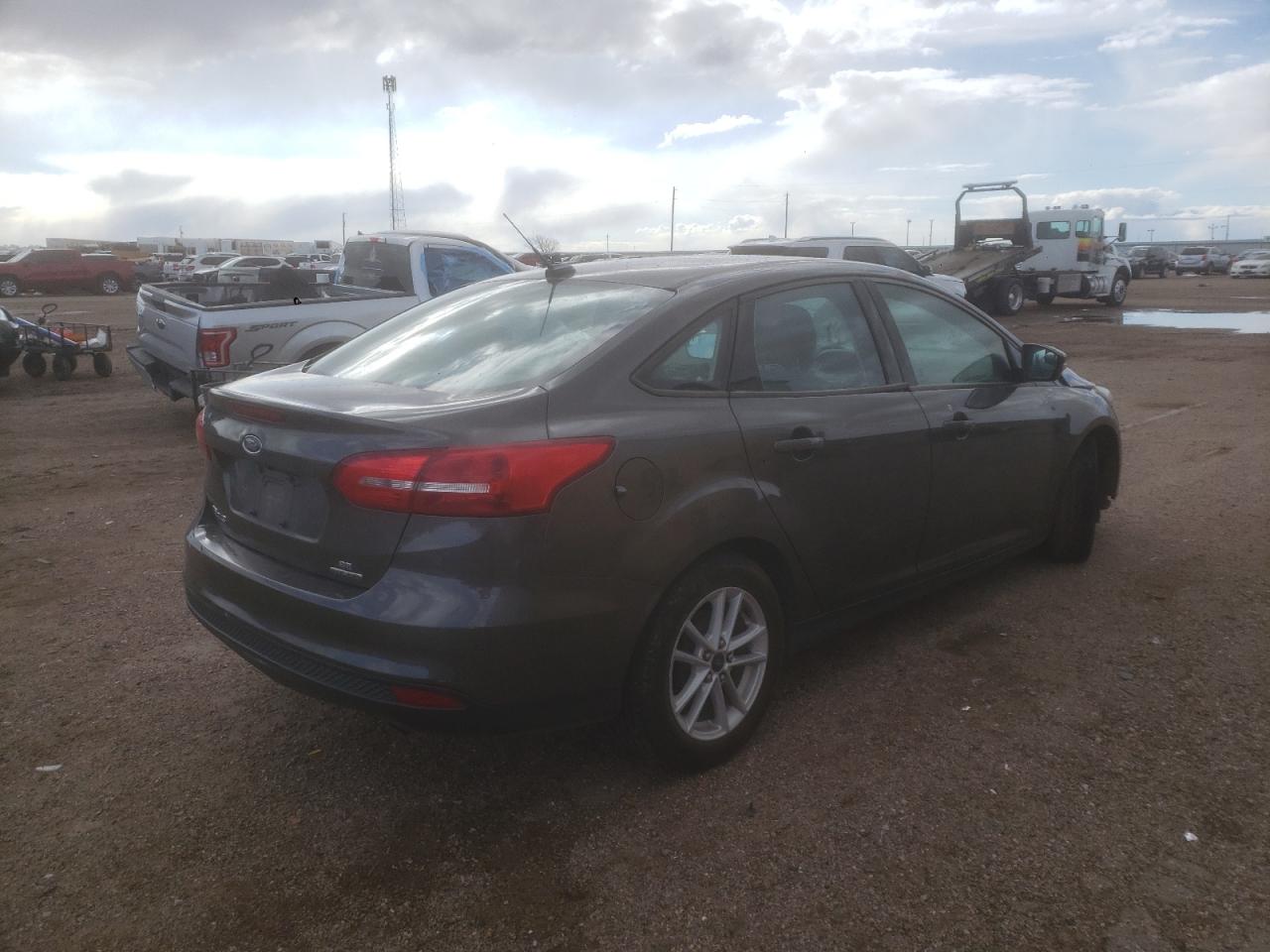 Photo 4 from auction – 2015 FORD FOCUS SE with VIN 1FADP3F23FL242673