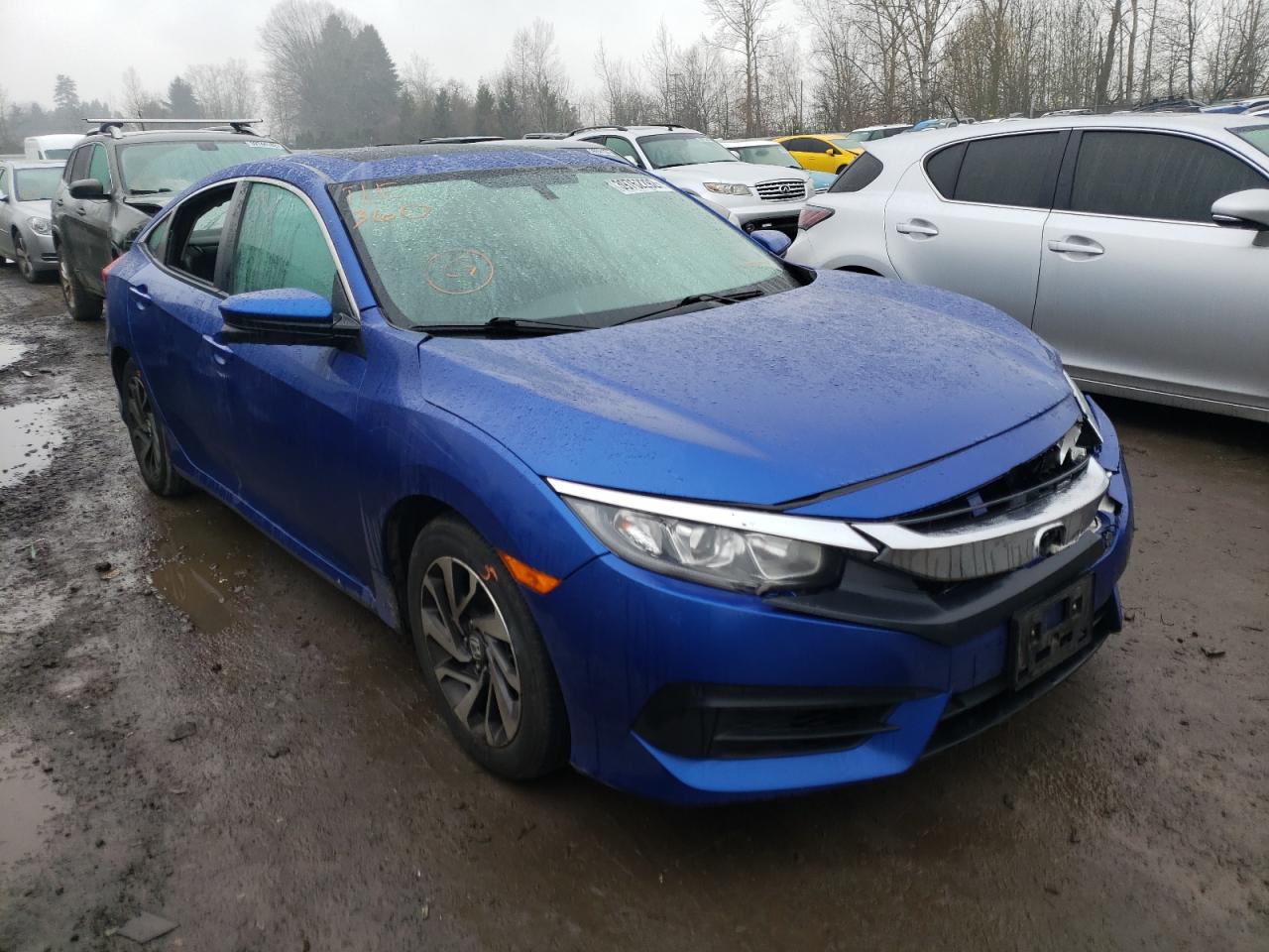 HONDA CIVIC EX 2017 with VIN 2HGFC2F7XHH535833 - Photo from auction