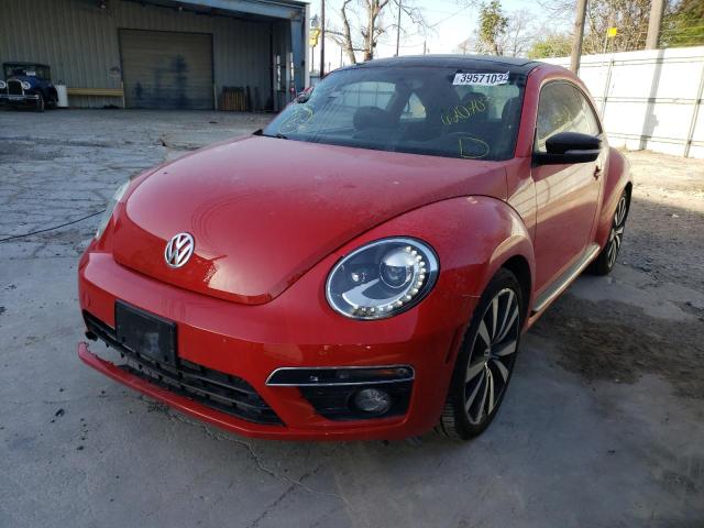 Photo 2 from auction – 2014 VOLKSWAGEN BEETLE TUR with VIN 3VWVS7AT3EM620750