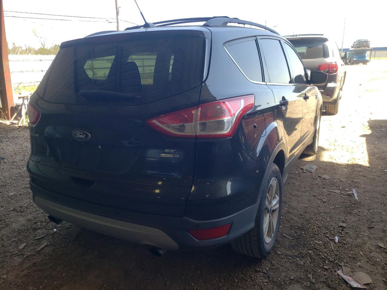 Photo 4 from auction – 2014 FORD ESCAPE SE with VIN 1FMCU9G98EUE19512