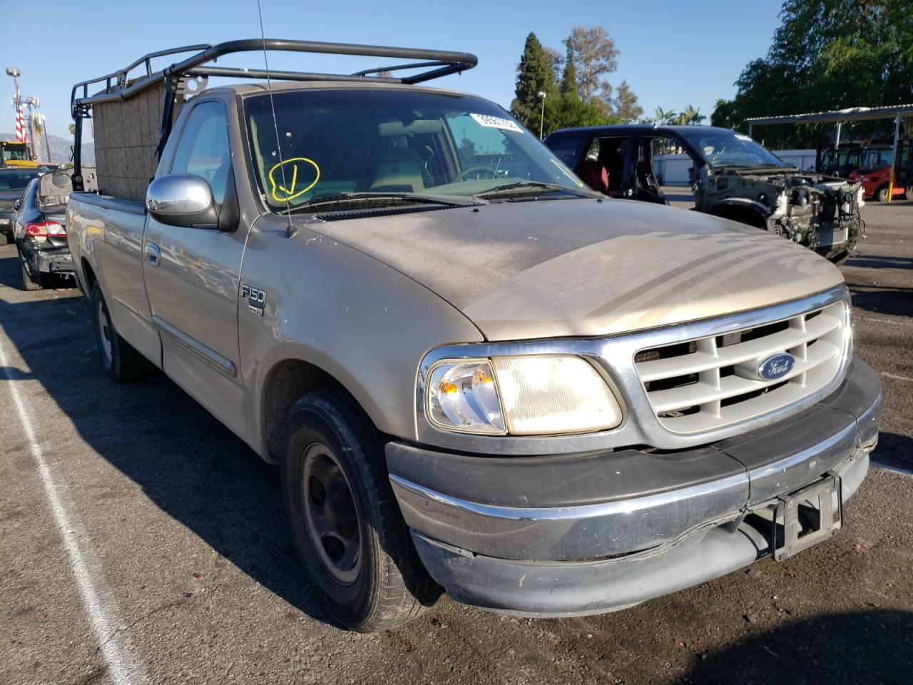 FORD F150 1999 with VIN 1FTRF17L0XKA67241 - Photo from auction