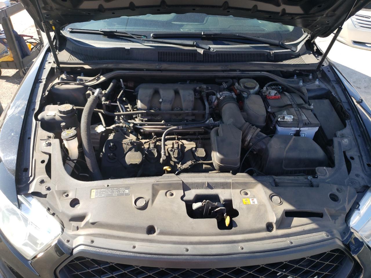 Photo 7 from auction – 2013 FORD TAURUS POL with VIN 1FAHP2M87DG199805