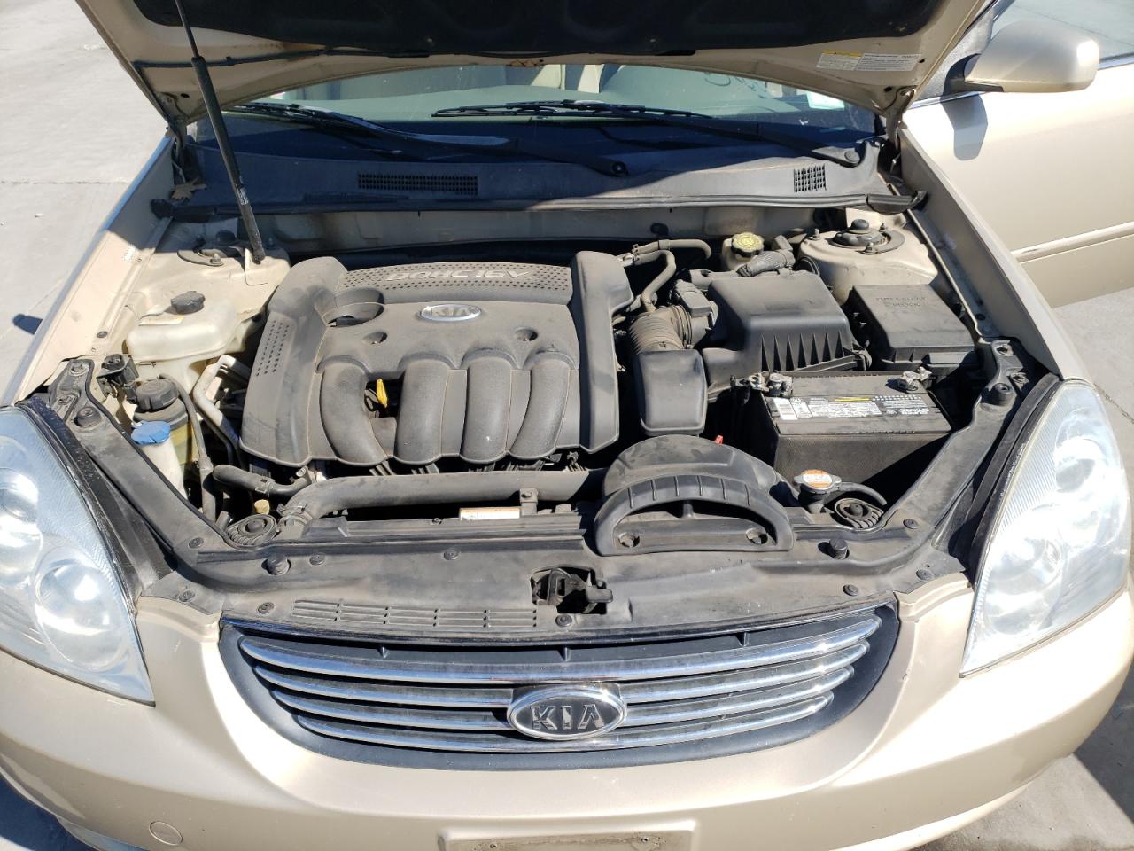 Photo 7 from auction – 2007 KIA OPTIMA LX with VIN KNAGE123675109831