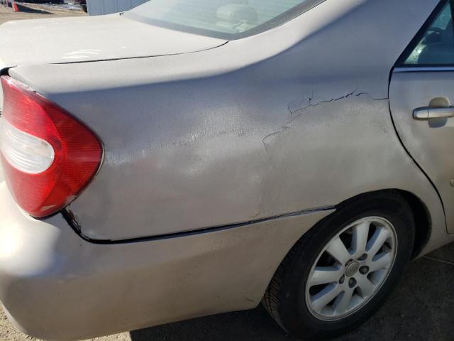 Photo 9 from auction – 2004 TOYOTA CAMRY LE with VIN 4T1BF30K34U574094