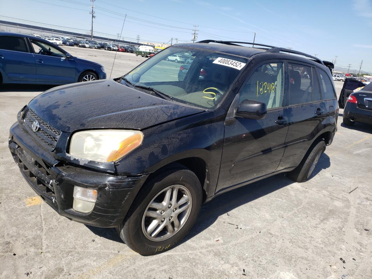 Photo 2 from auction – 2003 TOYOTA RAV4 with VIN JTEGH20V530112842