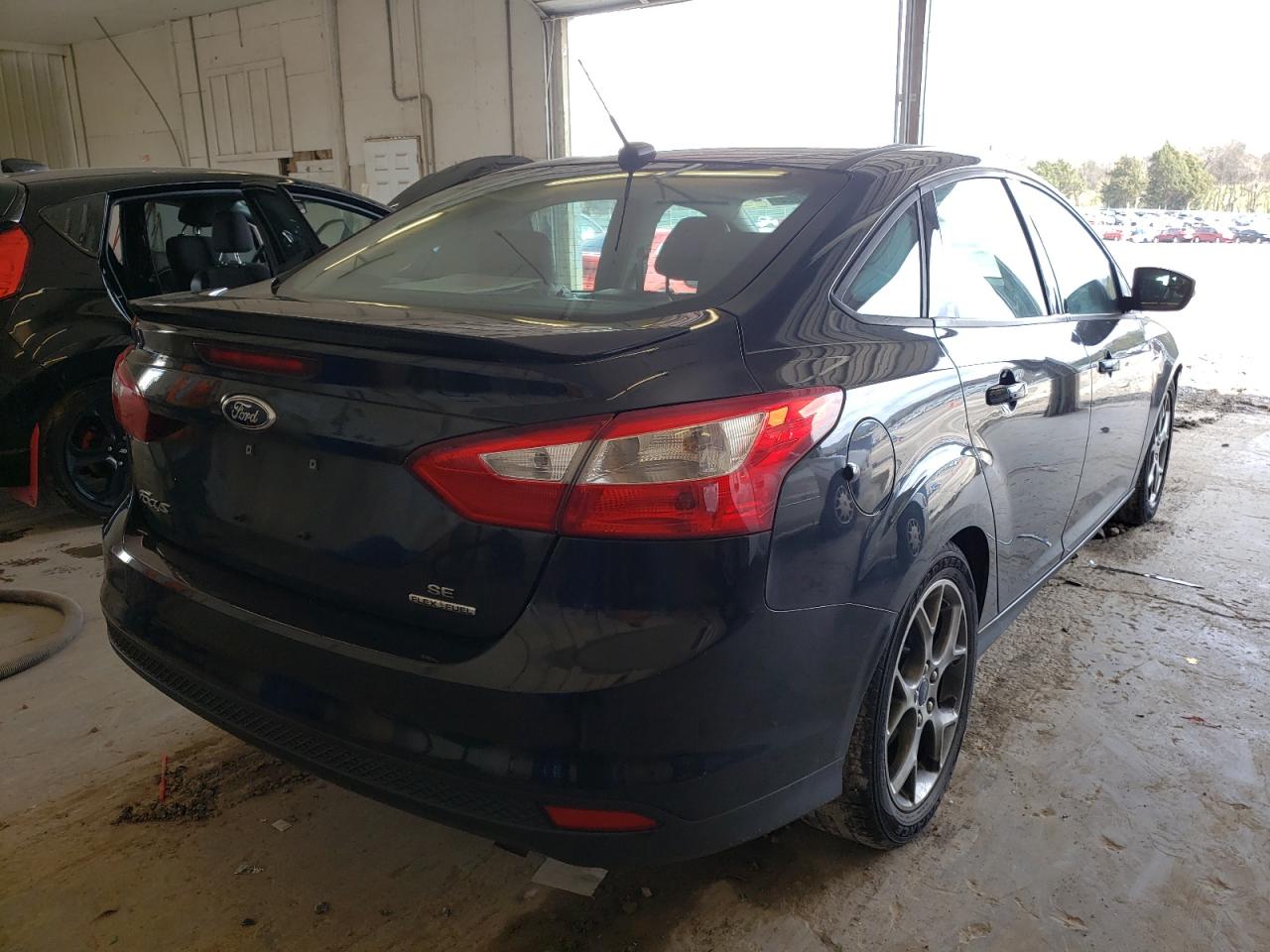 Photo 4 from auction – 2014 FORD FOCUS SE with VIN 1FADP3F21EL240466