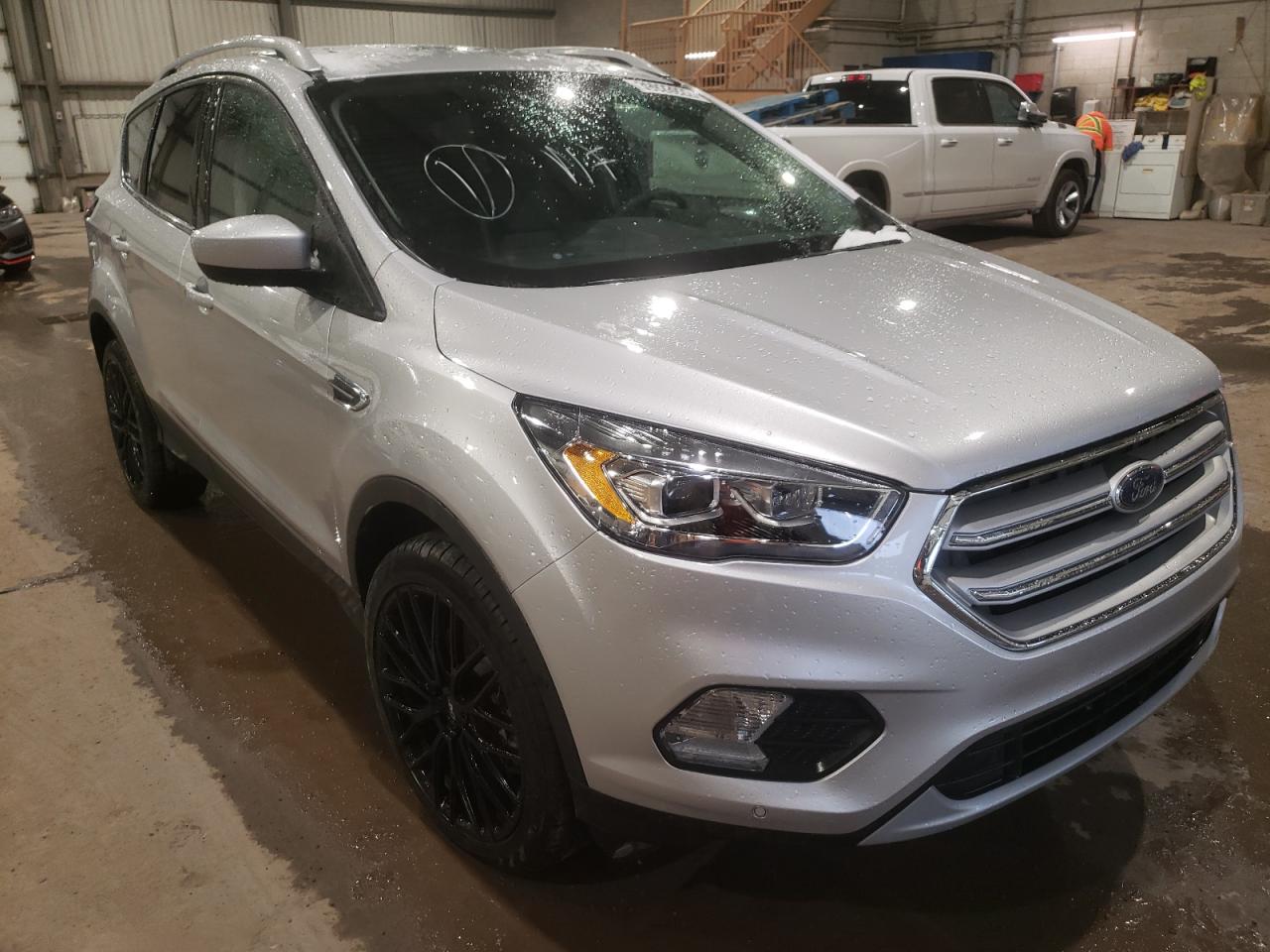 FORD ESCAPE TIT 2019 with VIN 1FMCU9J9XKUB35559 - Photo from auction