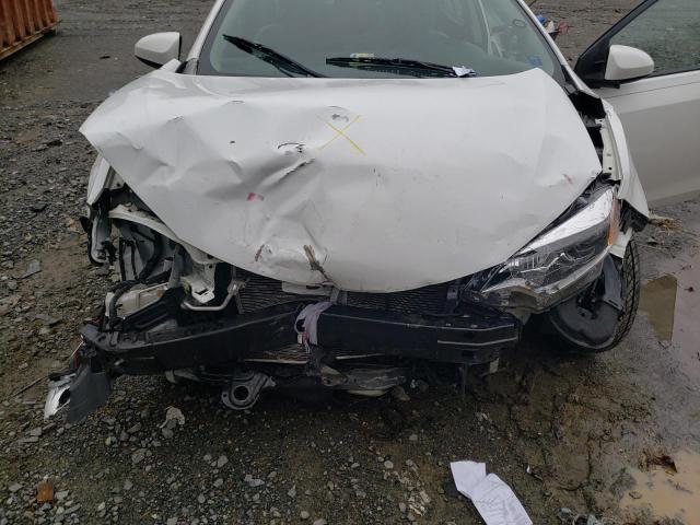 Photo 9 from auction – 2014 TOYOTA COROLLA L with VIN 2T1BURHEXEC133282