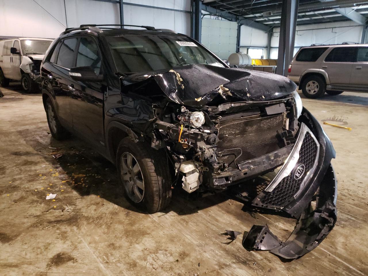 KIA SORENTO LX 2013 with VIN 5XYKTDA67DG409901 - Photo from auction