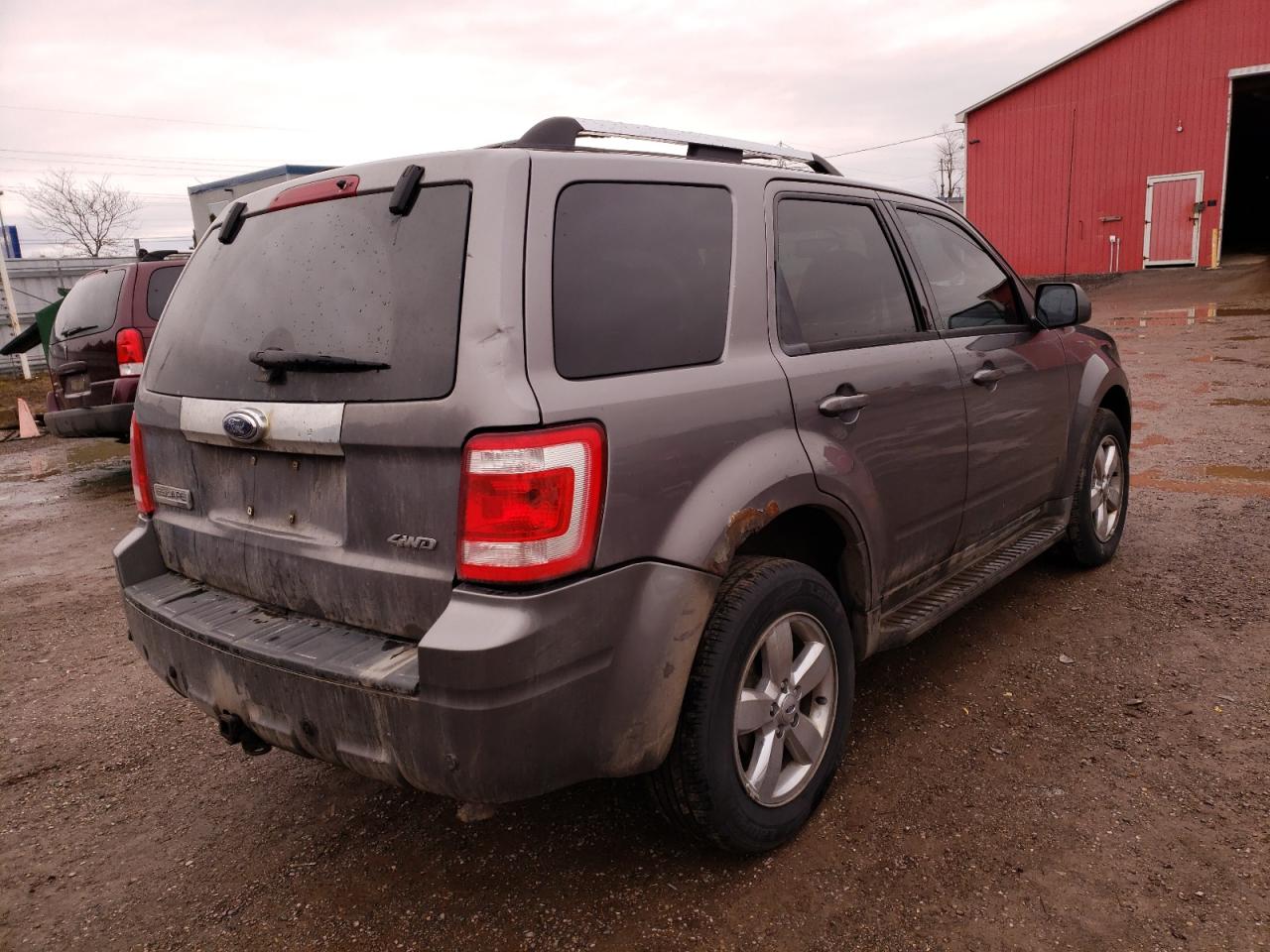 Photo 4 from auction – 2009 FORD ESCAPE LIM with VIN 1FMCU94G79KC64181