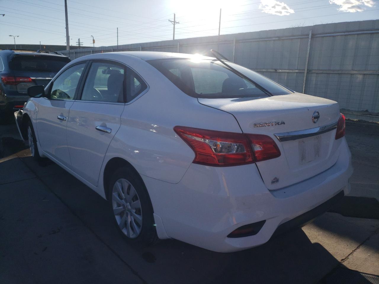 Photo 3 from auction – 2016 NISSAN SENTRA S with VIN 3N1AB7AP0GY283568