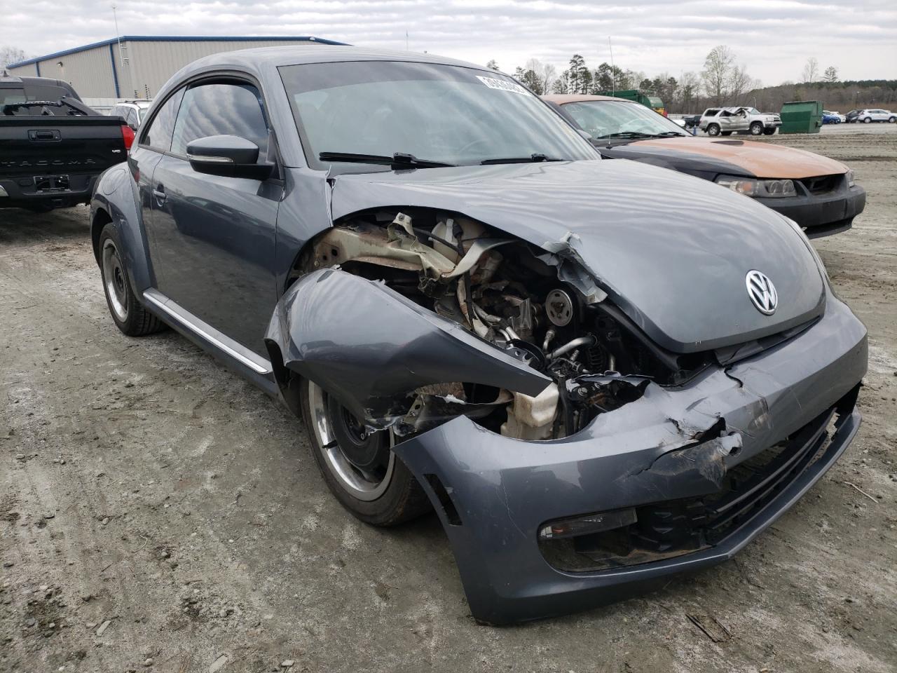 VOLKSWAGEN BEETLE 2013 with VIN 3VWJP7ATXDM673119 - Photo from auction