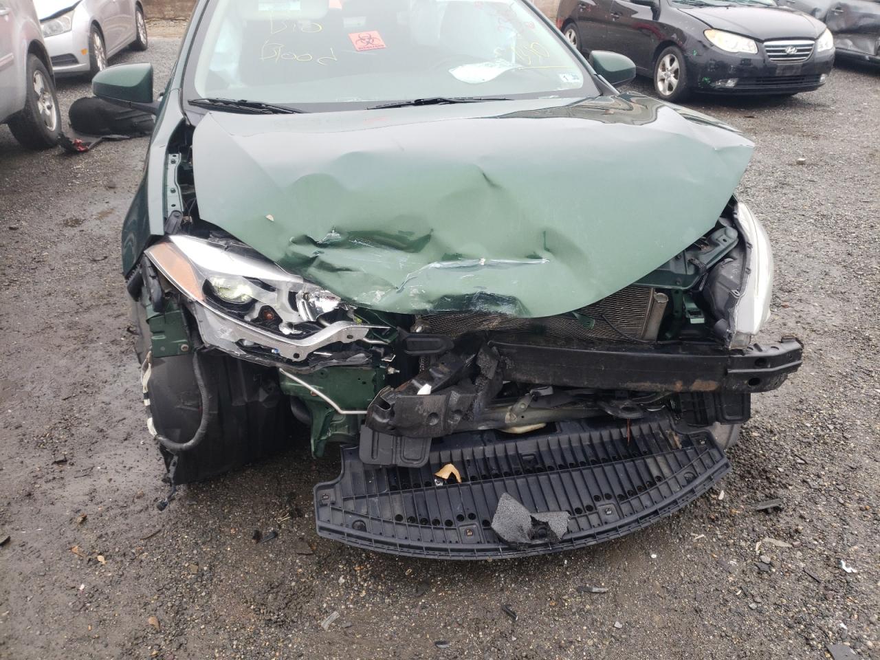 Photo 9 from auction – 2014 TOYOTA COROLLA L with VIN 2T1BURHE5EC037754