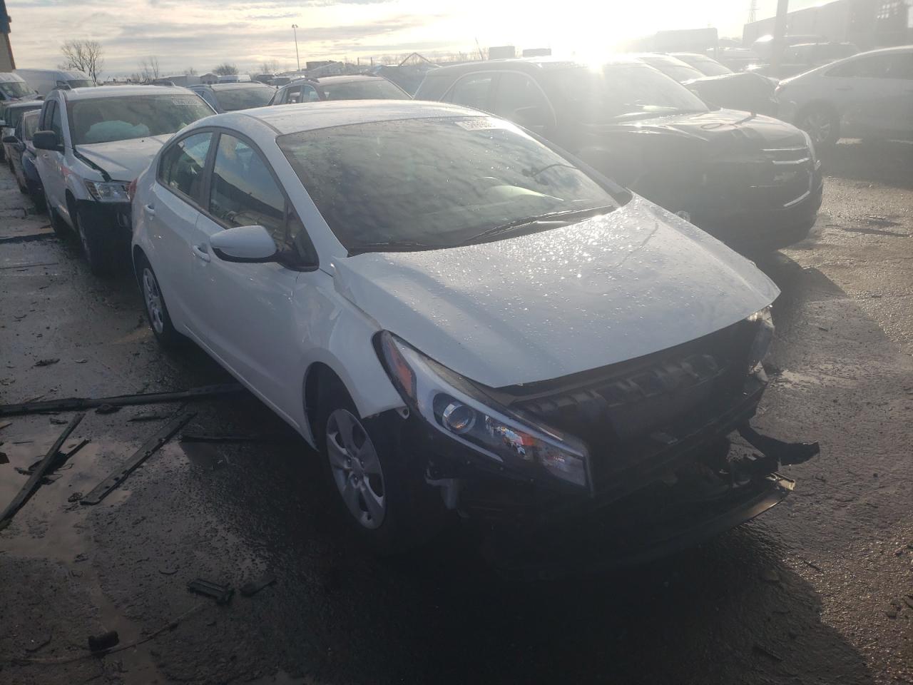 KIA FORTE LX 2017 with VIN 3KPFK4A7XHE091479 - Photo from auction