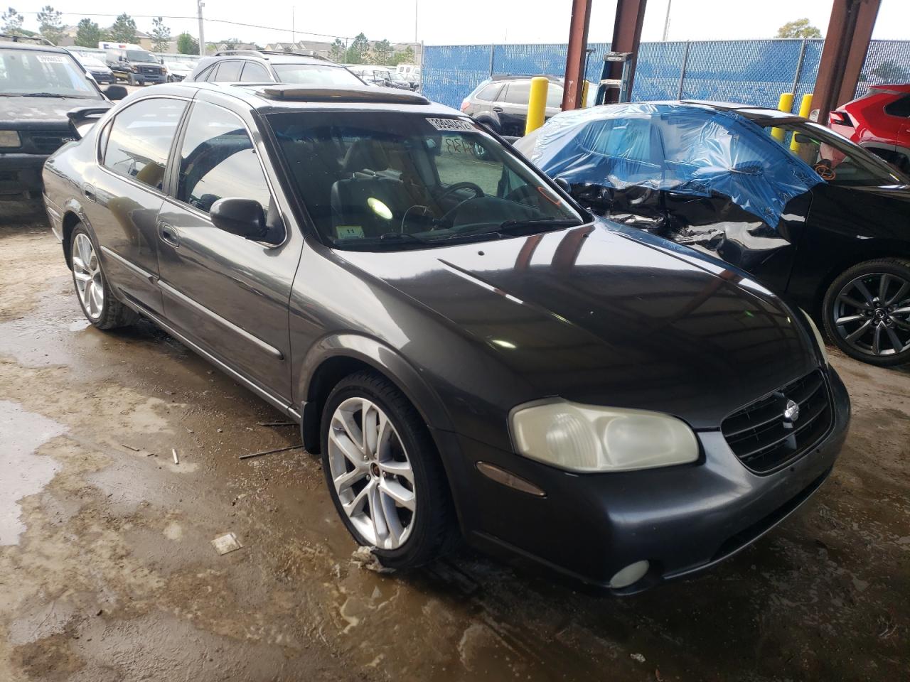 NISSAN MAXIMA 2000 with VIN JN1CA31A3YT022770 - Photo from auction