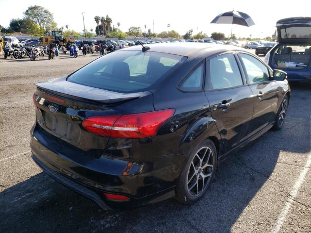 Photo 4 from auction – 2016 FORD FOCUS SE with VIN 1FADP3F22GL225560