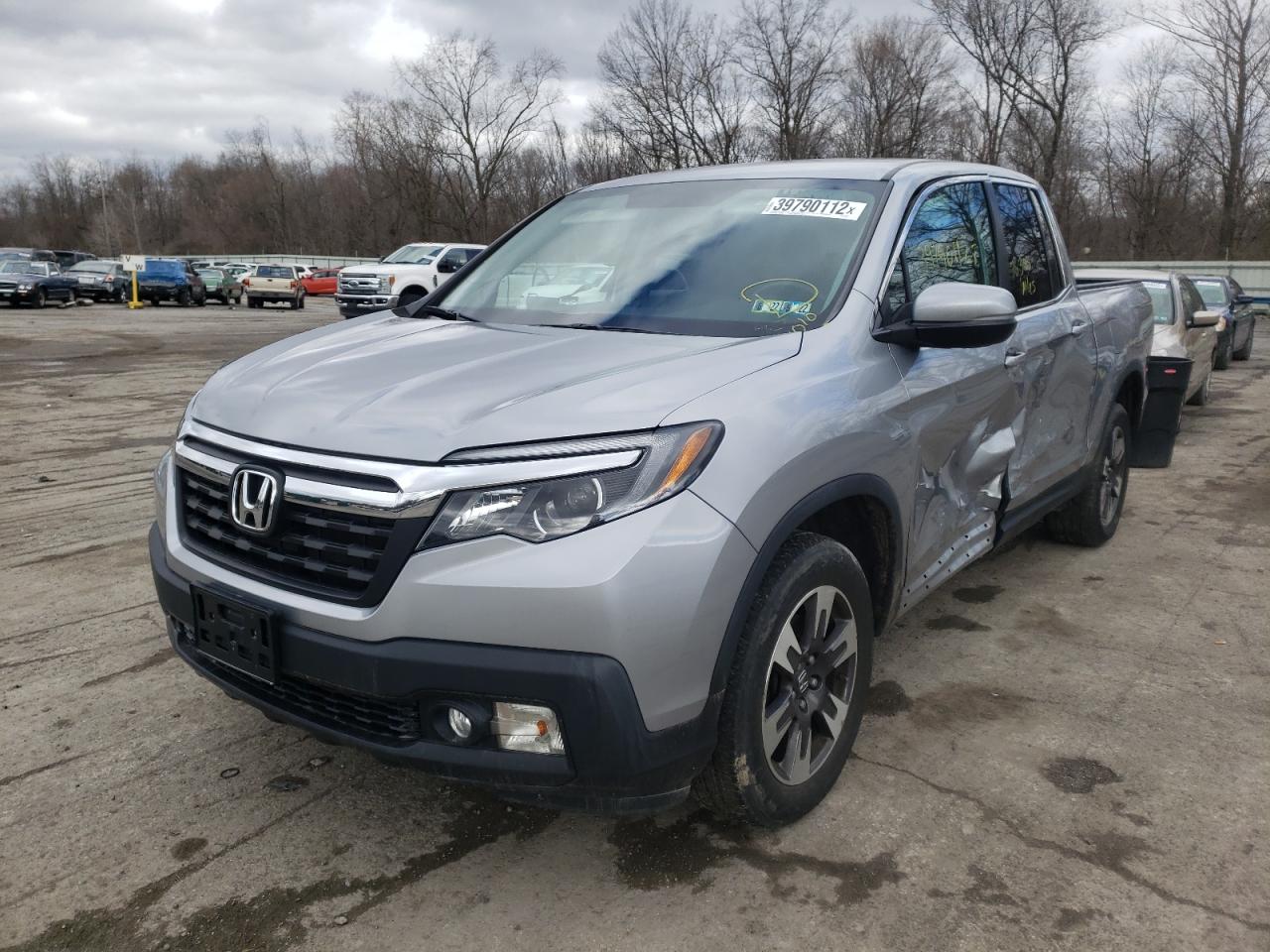 Photo 2 from auction – 2017 HONDA RIDGELINE with VIN 5FPYK3F50HB033960