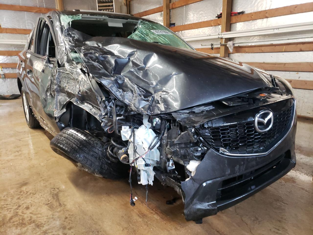 MAZDA CX-5 TOURI 2014 with VIN JM3KE4CYXE0365058 - Photo from auction