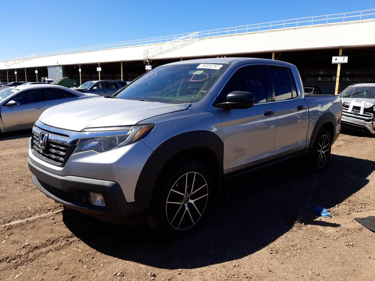Photo 2 from auction – 2017 HONDA RIDGELINE with VIN 5FPYK2F2XHB007379