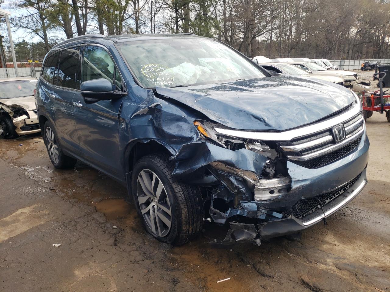 HONDA PILOT TOUR 2016 with VIN 5FNYF5H98GB010062 - Photo from auction