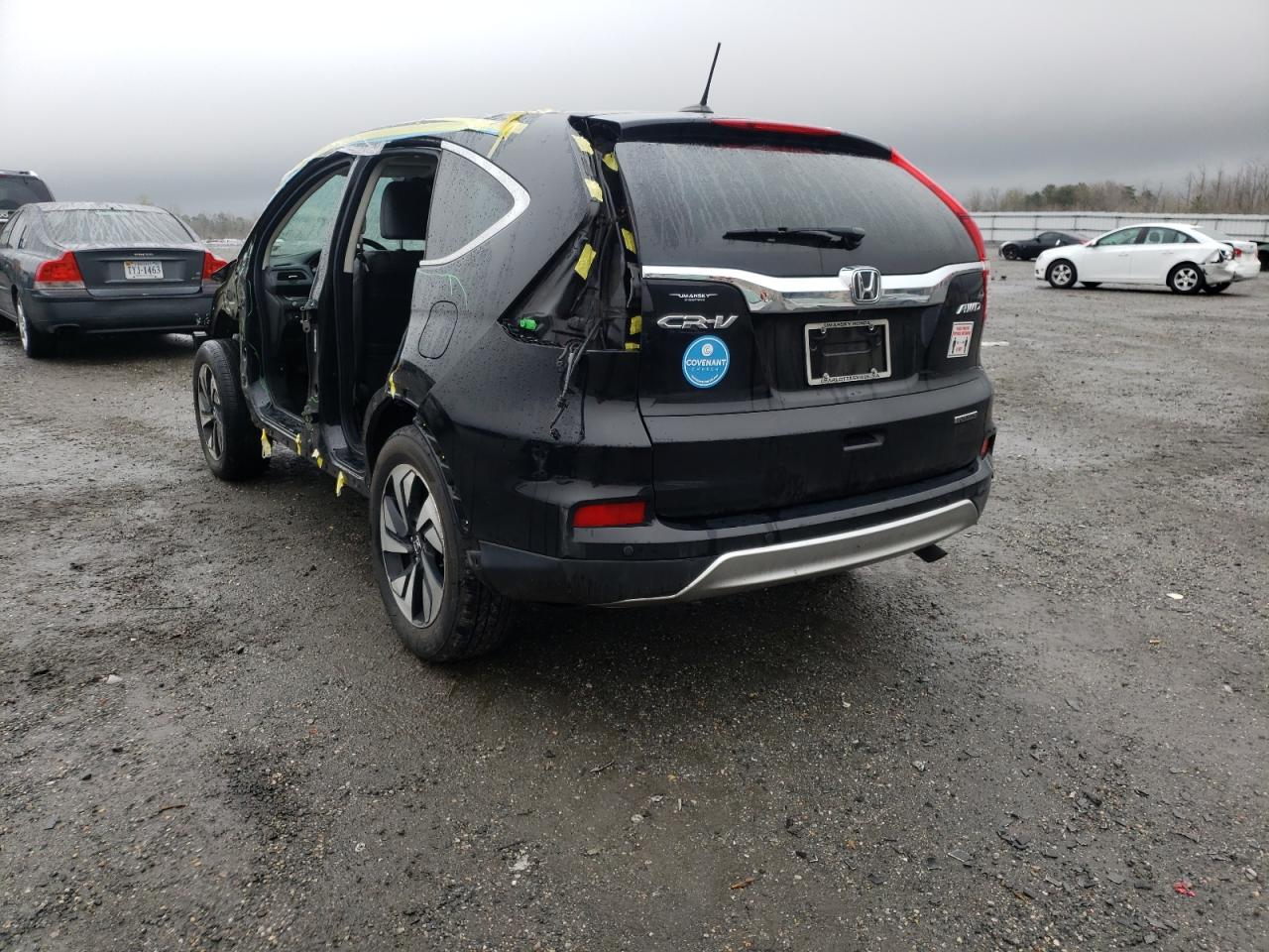 Photo 3 from auction – 2016 HONDA CR-V TOURI with VIN 5J6RM4H99GL057337