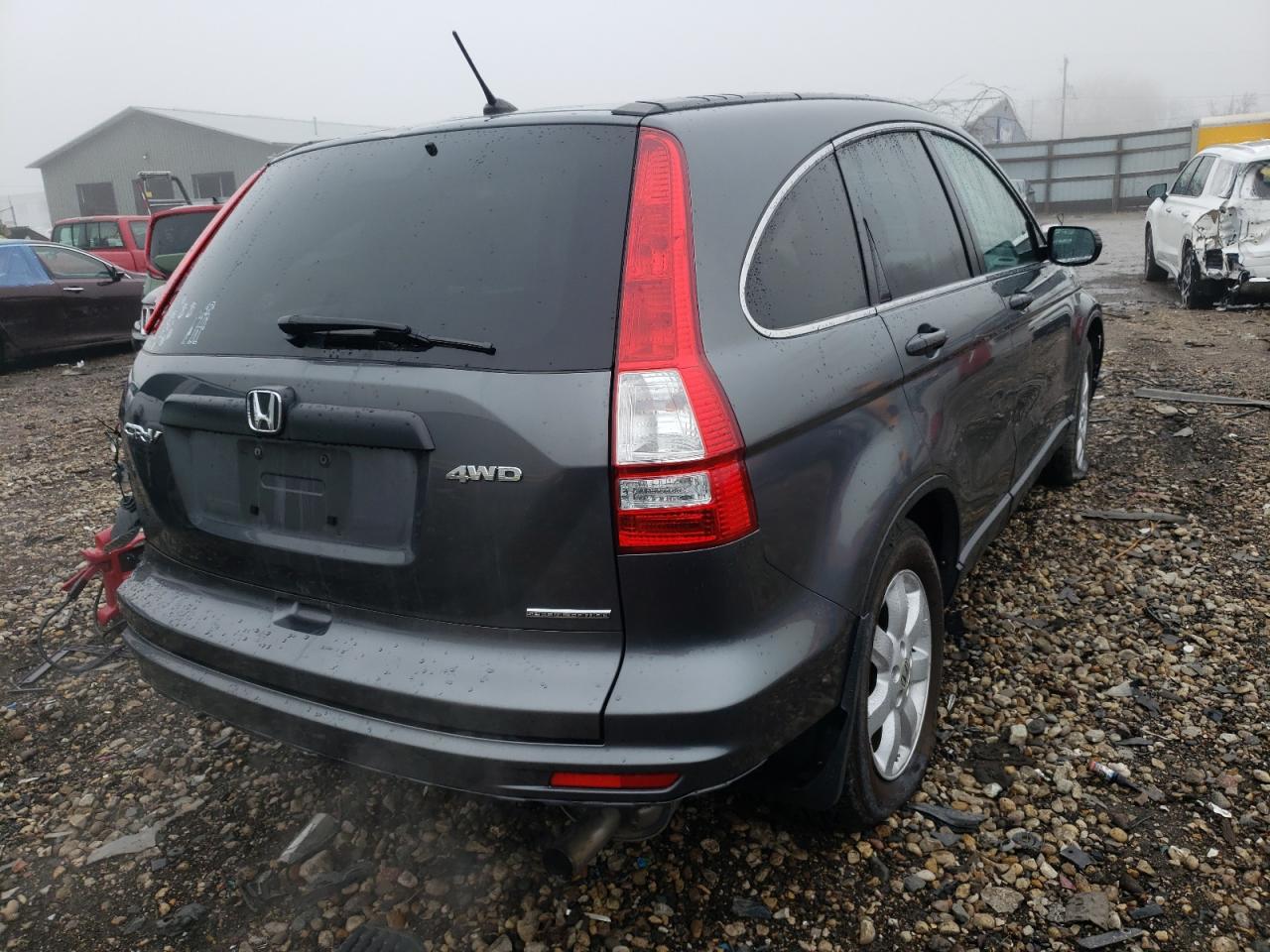 Photo 4 from auction – 2011 HONDA CR-V SE with VIN 5J6RE4H41BL100014