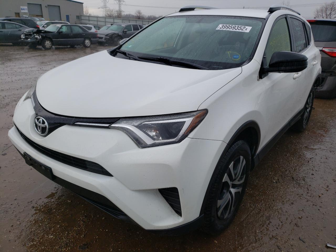 Photo 2 from auction – 2016 TOYOTA RAV4 LE with VIN JTMZFREV7GD082990