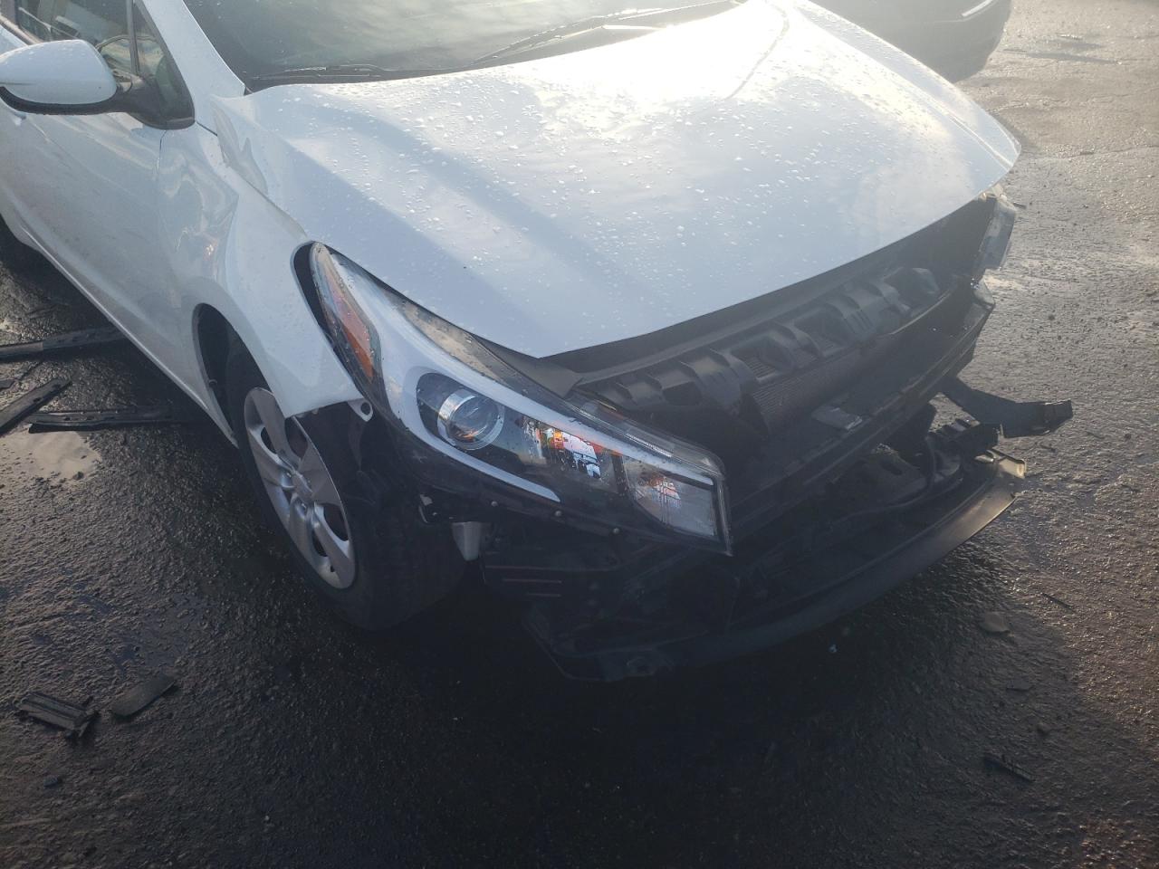 Photo 9 from auction – 2017 KIA FORTE LX with VIN 3KPFK4A7XHE091479