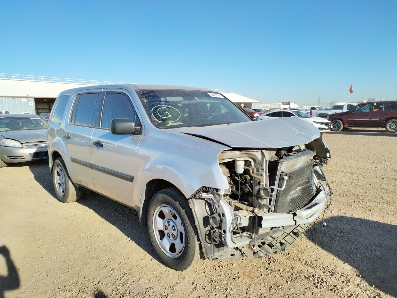 HONDA PILOT LX 2015 with VIN 5FNYF3H27FB028512 - Photo from auction