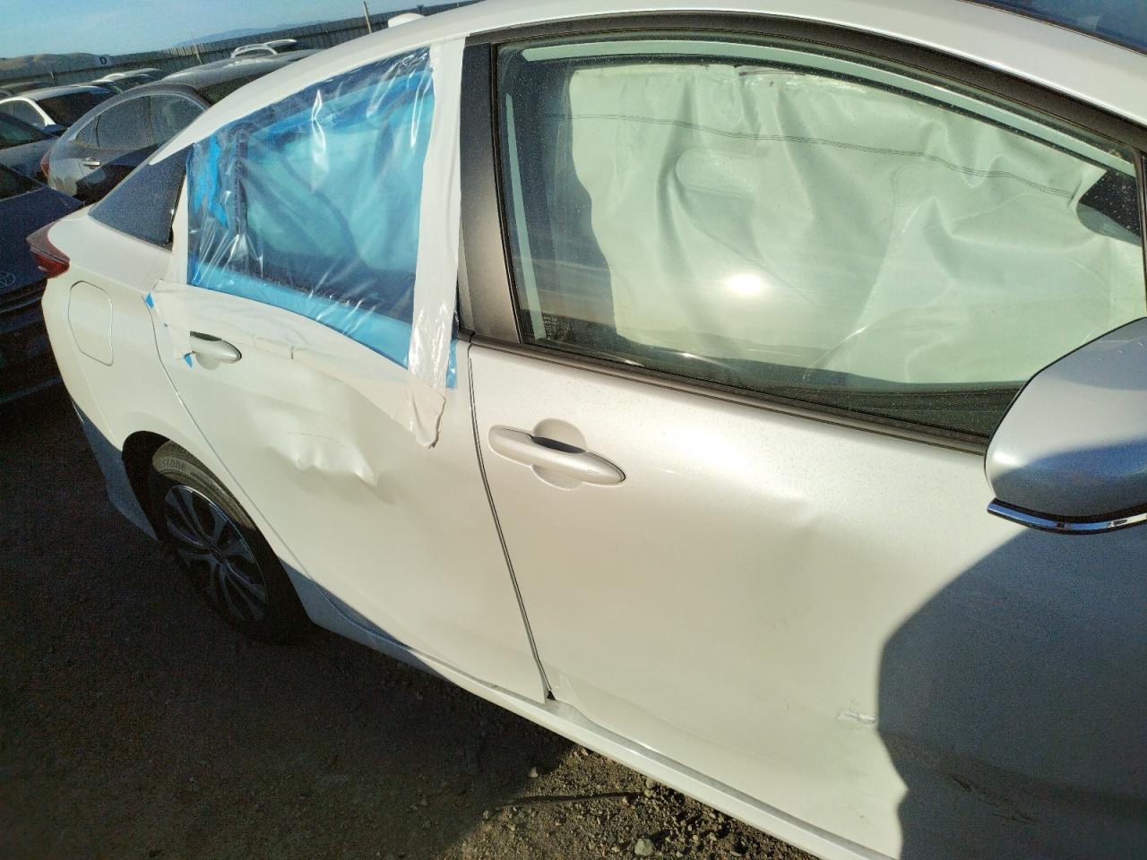 Photo 9 from auction – 2022 TOYOTA PRIUS PRIM with VIN JTDKAMFP4N3207868