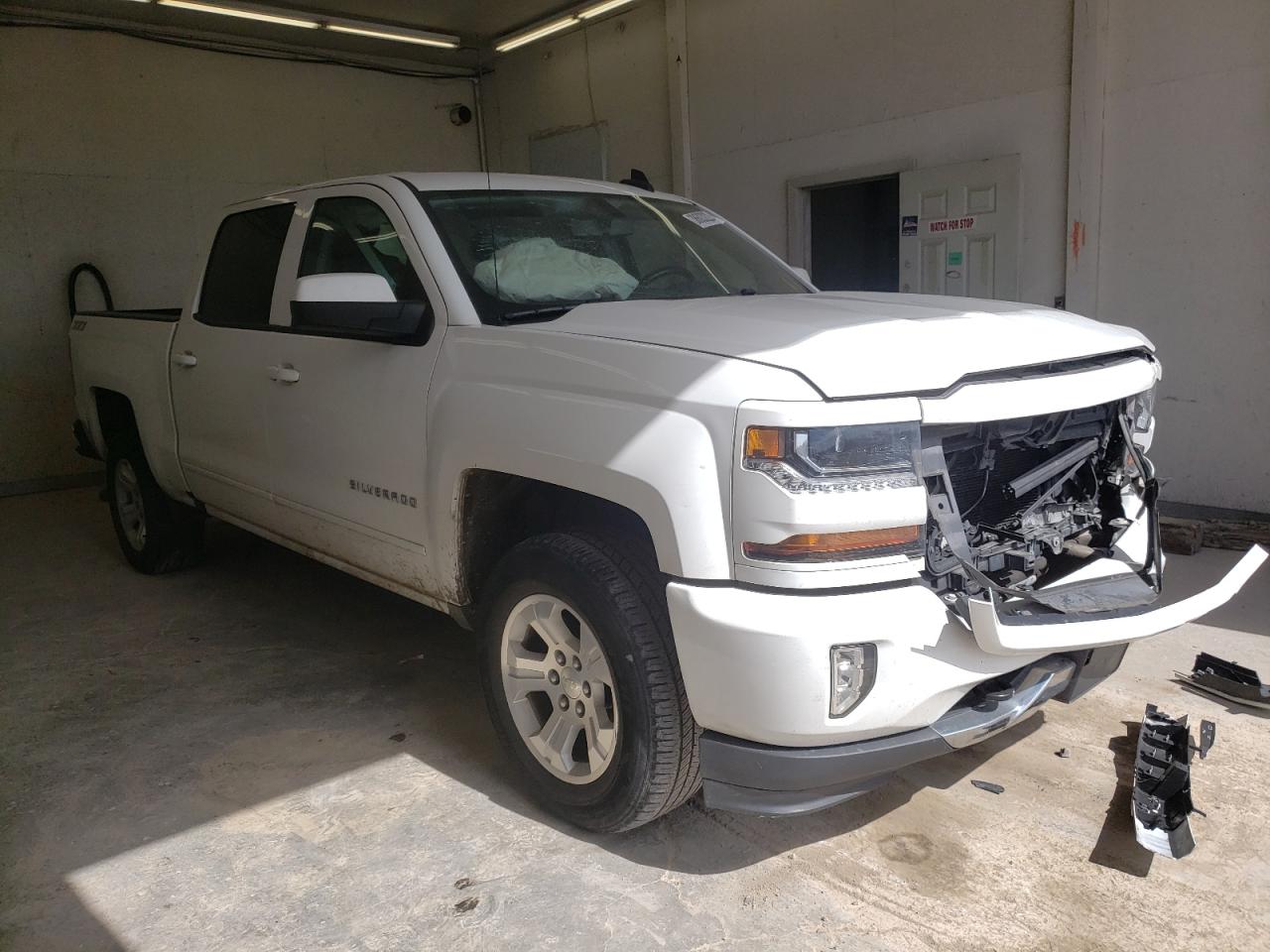 CHEVROLET SILVERADO 2017 with VIN 3GCUKREC9HG323344 - Photo from auction