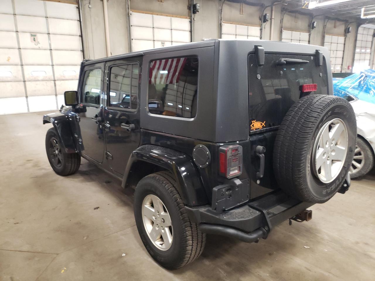 Photo 3 from auction – 2012 JEEP WRANGLER U with VIN 1C4BJWDG2CL251993