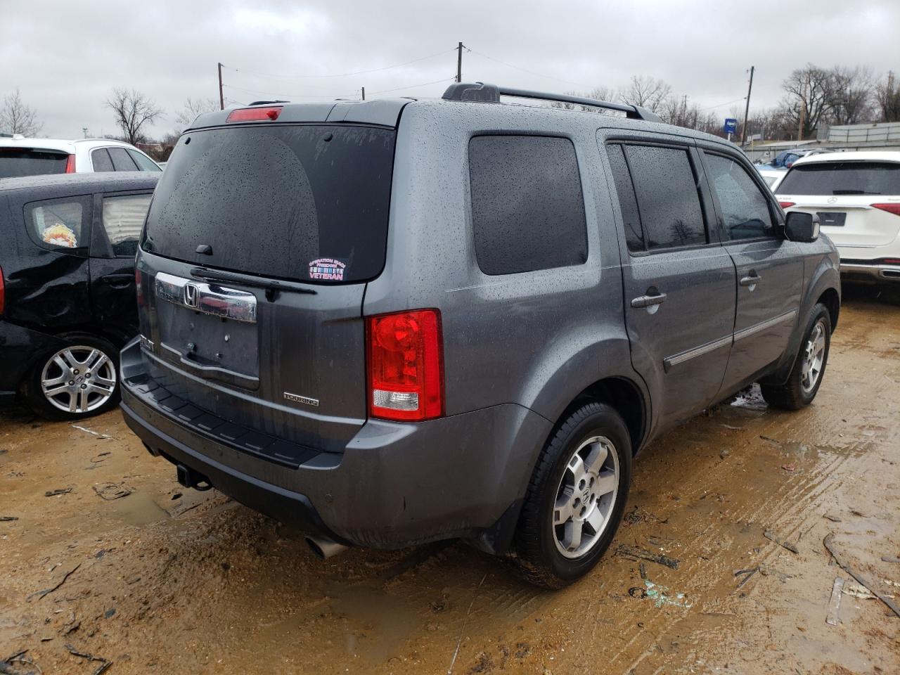 Photo 4 from auction – 2011 HONDA PILOT TOUR with VIN 5FNYF3H99BB057484