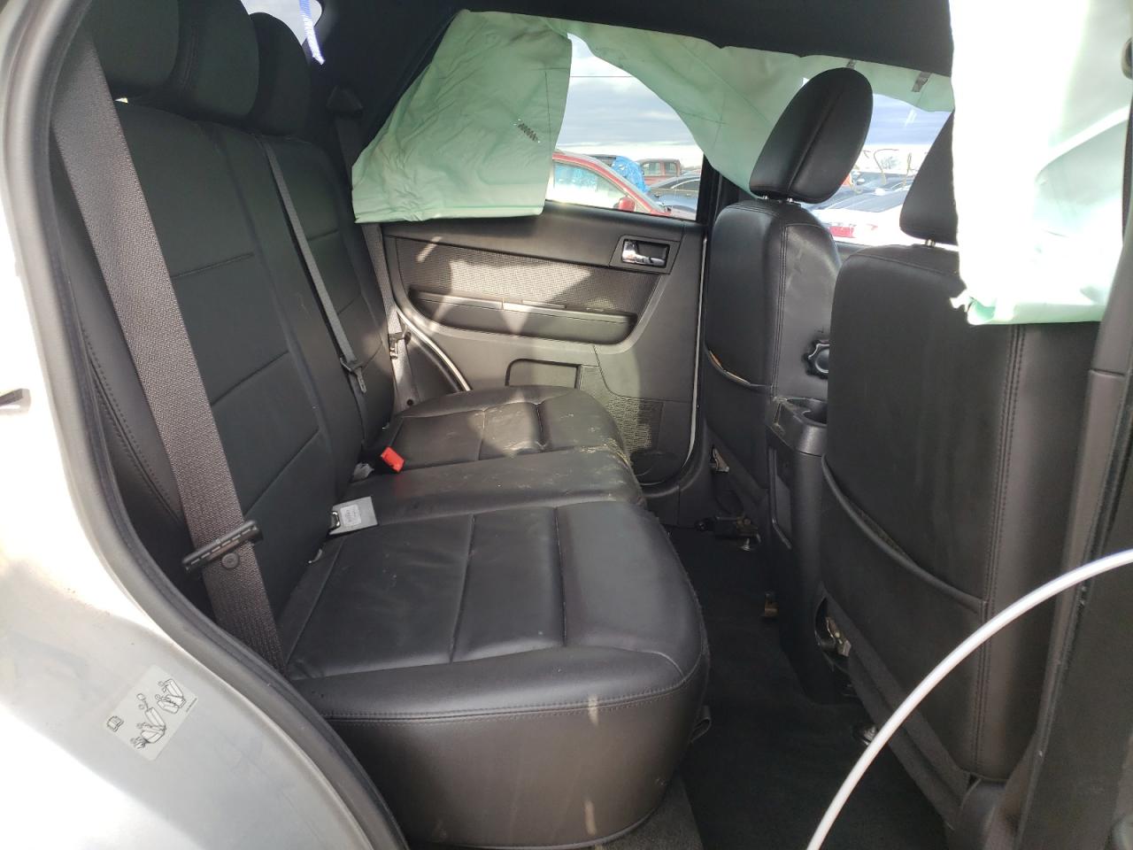 Photo 6 from auction – 2011 FORD ESCAPE LIM with VIN 1FMCU0E74BKB53894