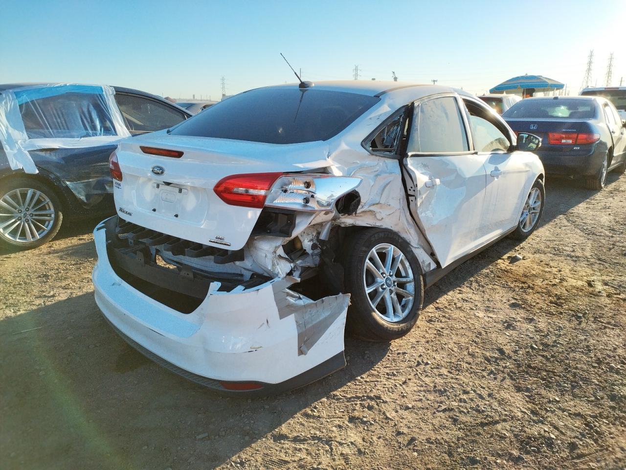 Photo 4 from auction – 2016 FORD FOCUS SE with VIN 1FADP3F2XGL273856