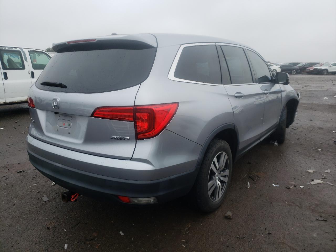 Photo 4 from auction – 2016 HONDA PILOT EXL with VIN 5FNYF6H52GB004311