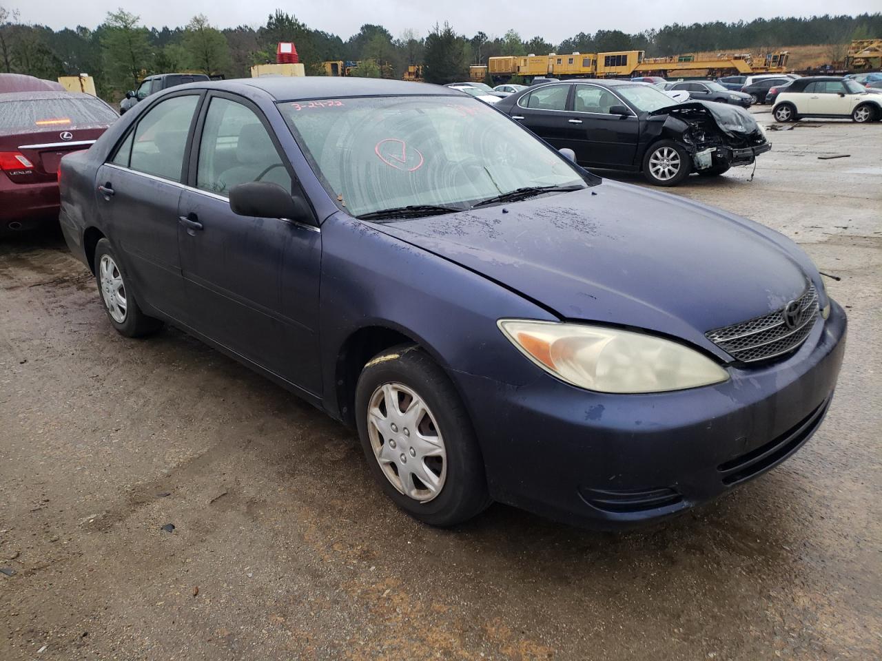 TOYOTA CAMRY LE 2002 with VIN JTDBE32K120054744 - Photo from auction