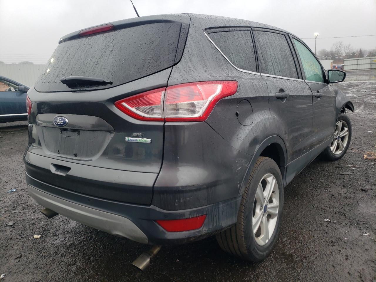 Photo 4 from auction – 2016 FORD ESCAPE SE with VIN 1FMCU0GX3GUB41177