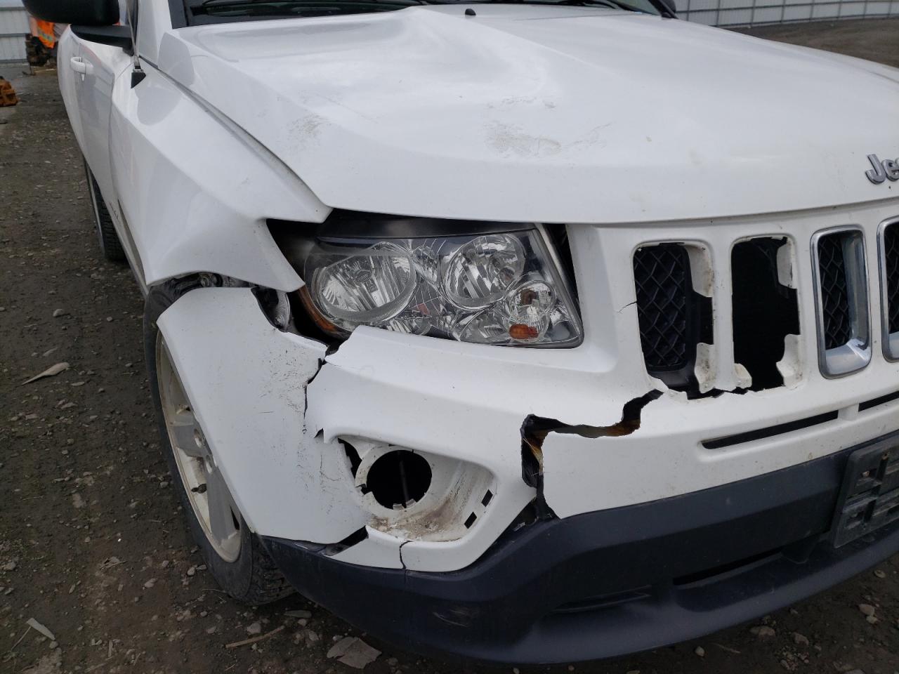 Photo 10 from auction – 2011 JEEP COMPASS LI with VIN 1J4NF5FB0BD182170
