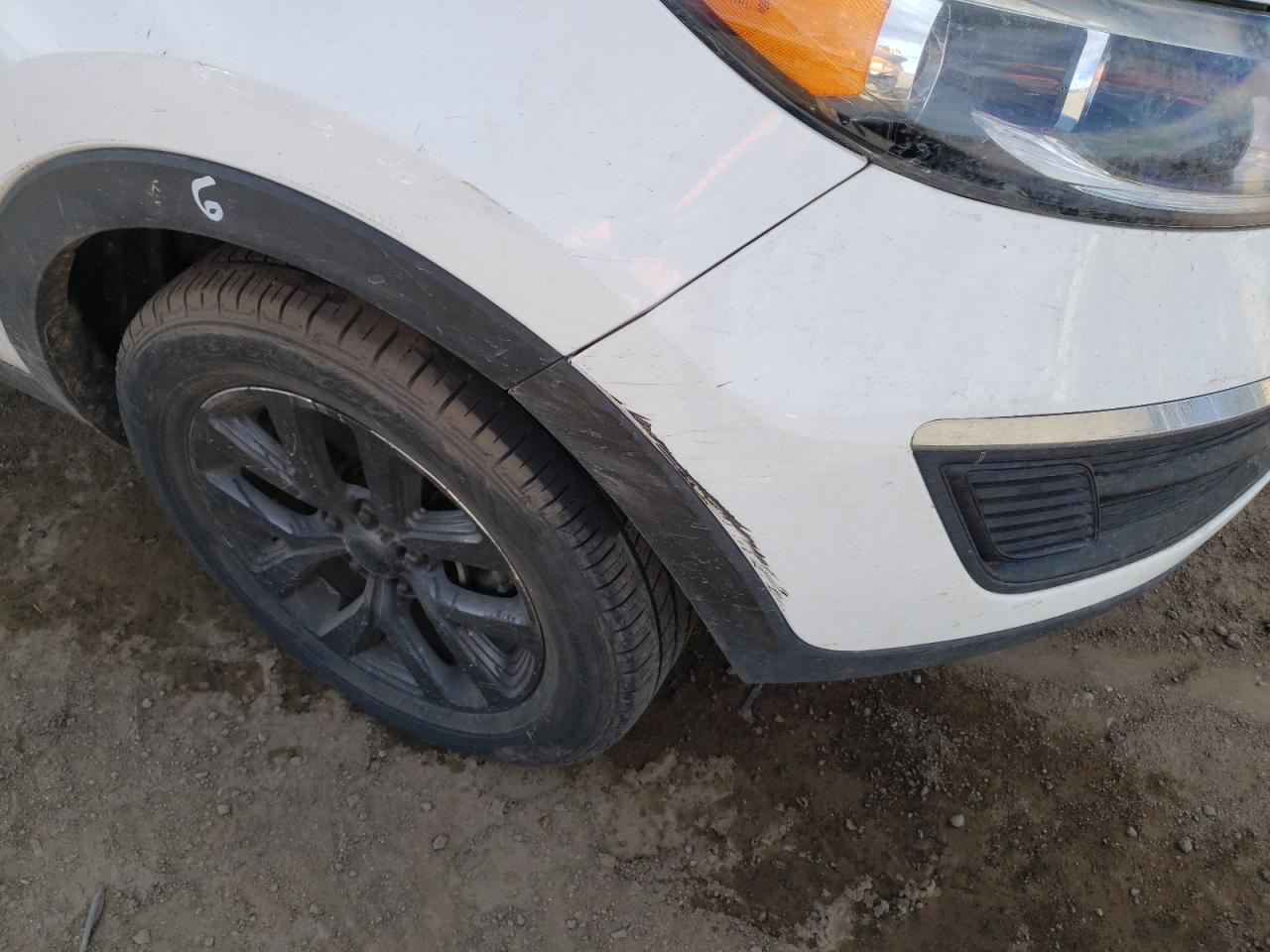 Photo 9 from auction – 2014 KIA SPORTAGE L with VIN KNDPBCAC2E7597993