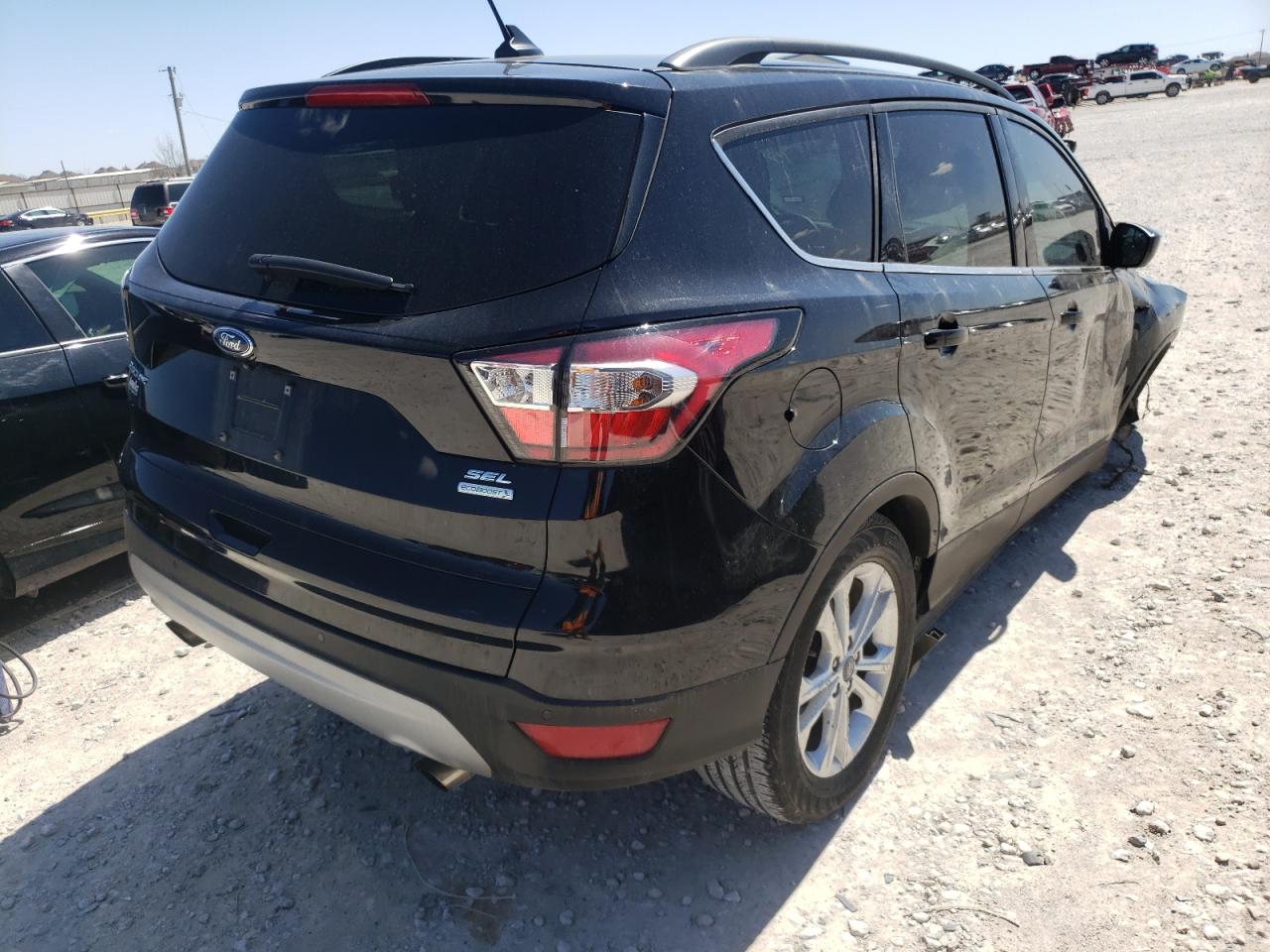 Zdjęcie 4 z aukcji – 2018 FORD ESCAPE SEL z VIN 1FMCU0HDXJUB24176