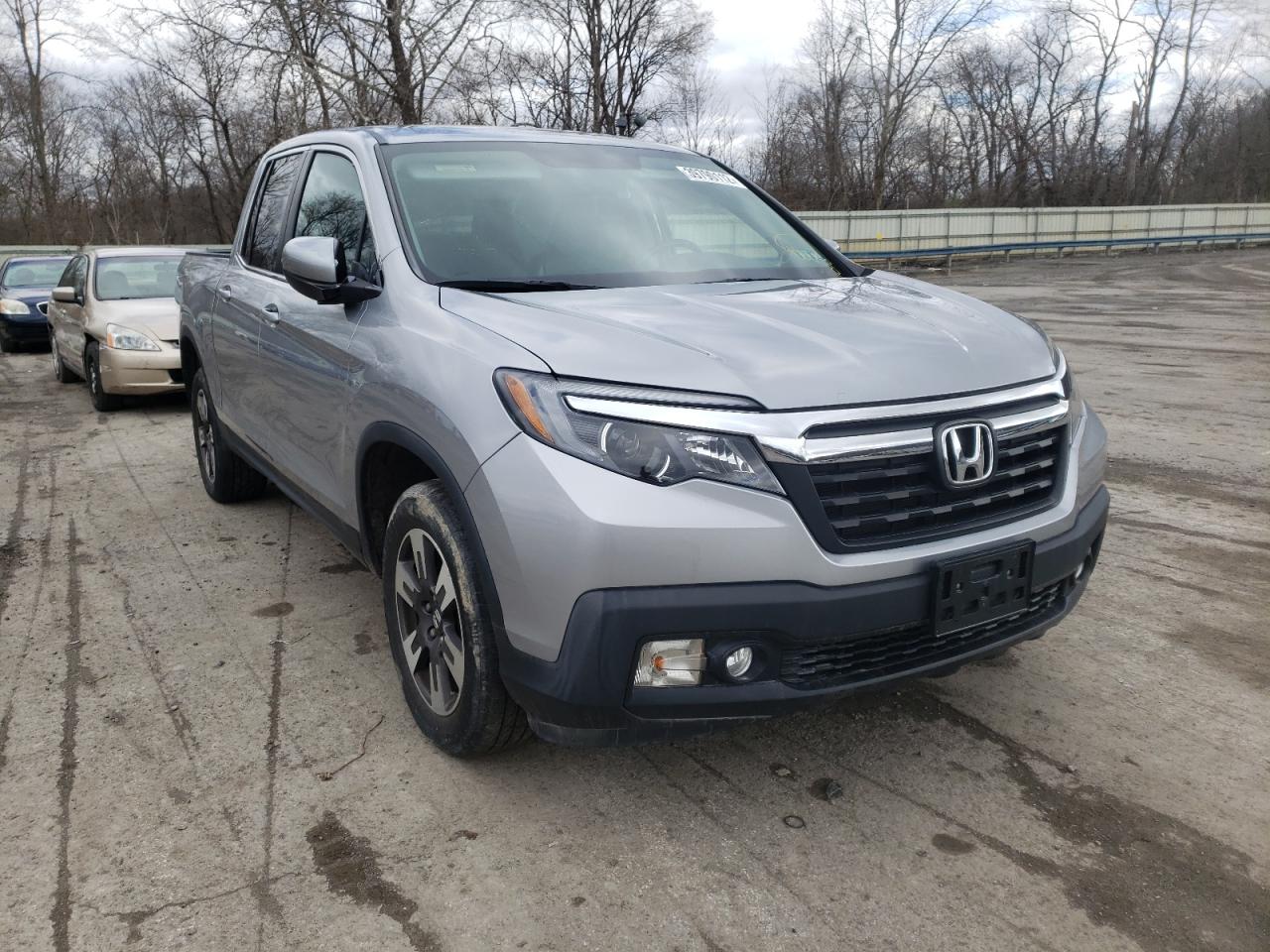 HONDA RIDGELINE 2017 with VIN 5FPYK3F50HB033960 - Photo from auction