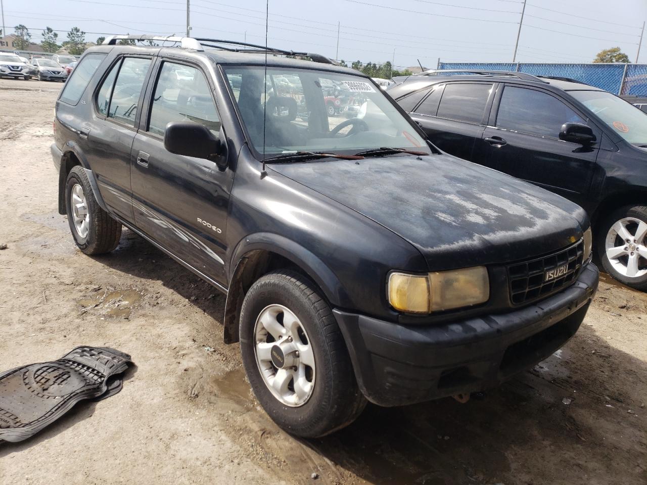 ISUZU RODEO S 1999 with VIN 4S2CM58W3X4370325 - Photo from auction