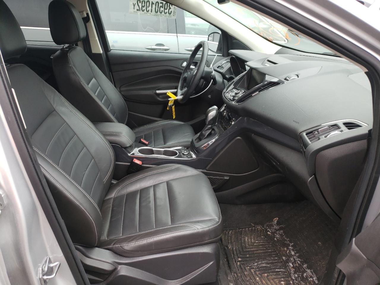Photo 5 from auction – 2014 FORD ESCAPE TIT with VIN 1FMCU9J98EUE26646