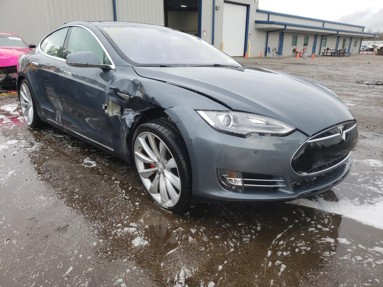 TESLA MODEL S 2014 with VIN 5YJSA1H15EFP47952 - Photo from auction