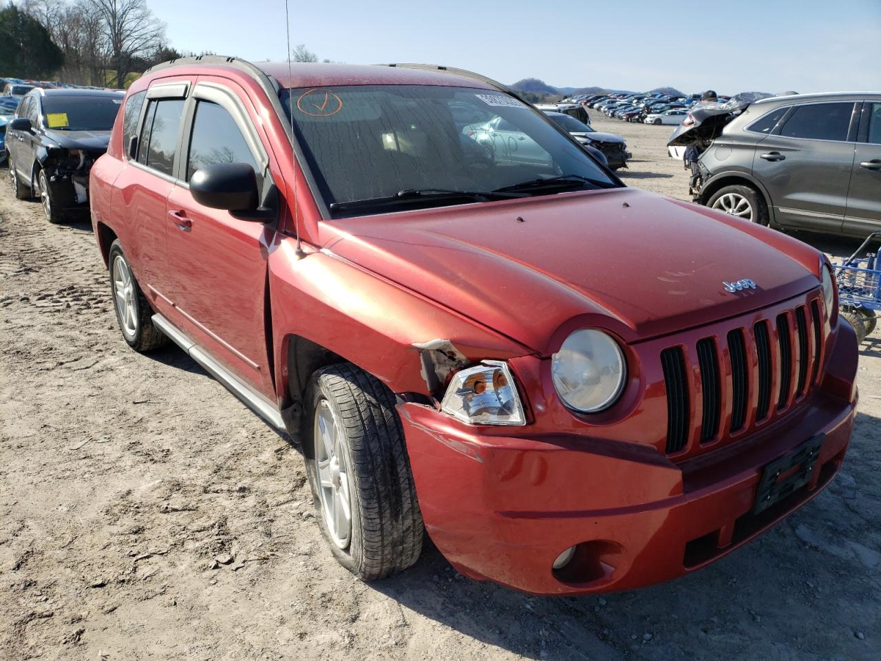 JEEP COMPASS SP 2010 with VIN 1J4NF4FB2AD502503 - Photo from auction
