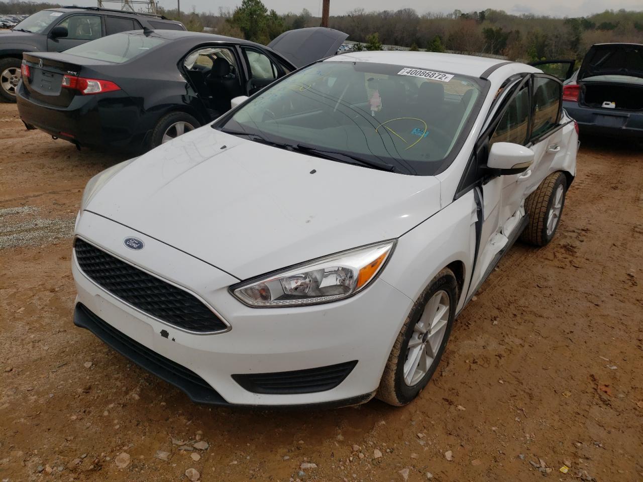 Photo 2 from auction – 2017 FORD FOCUS SE with VIN 1FADP3F26HL231864
