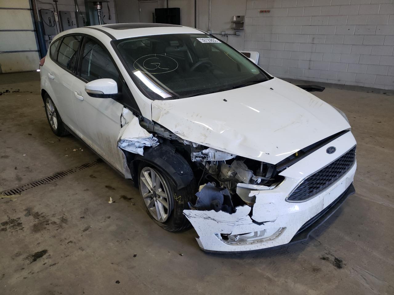 FORD FOCUS SE 2015 with VIN 1FADP3K28FL316739 - Photo from auction