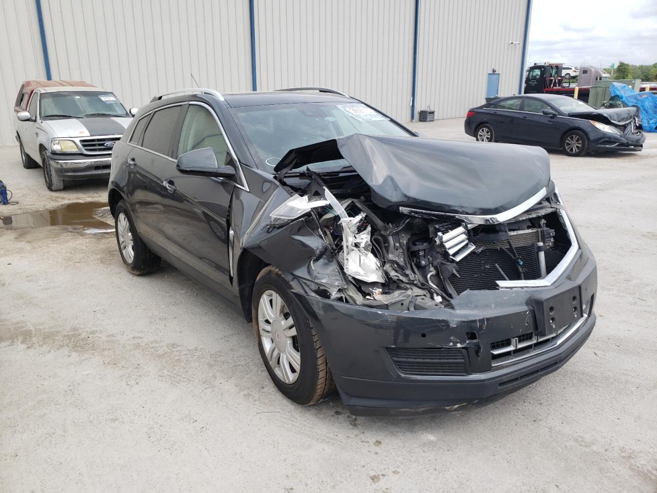 CADILLAC SRX LUXURY 2015 with VIN 3GYFNBE30FS620482 - Photo from auction