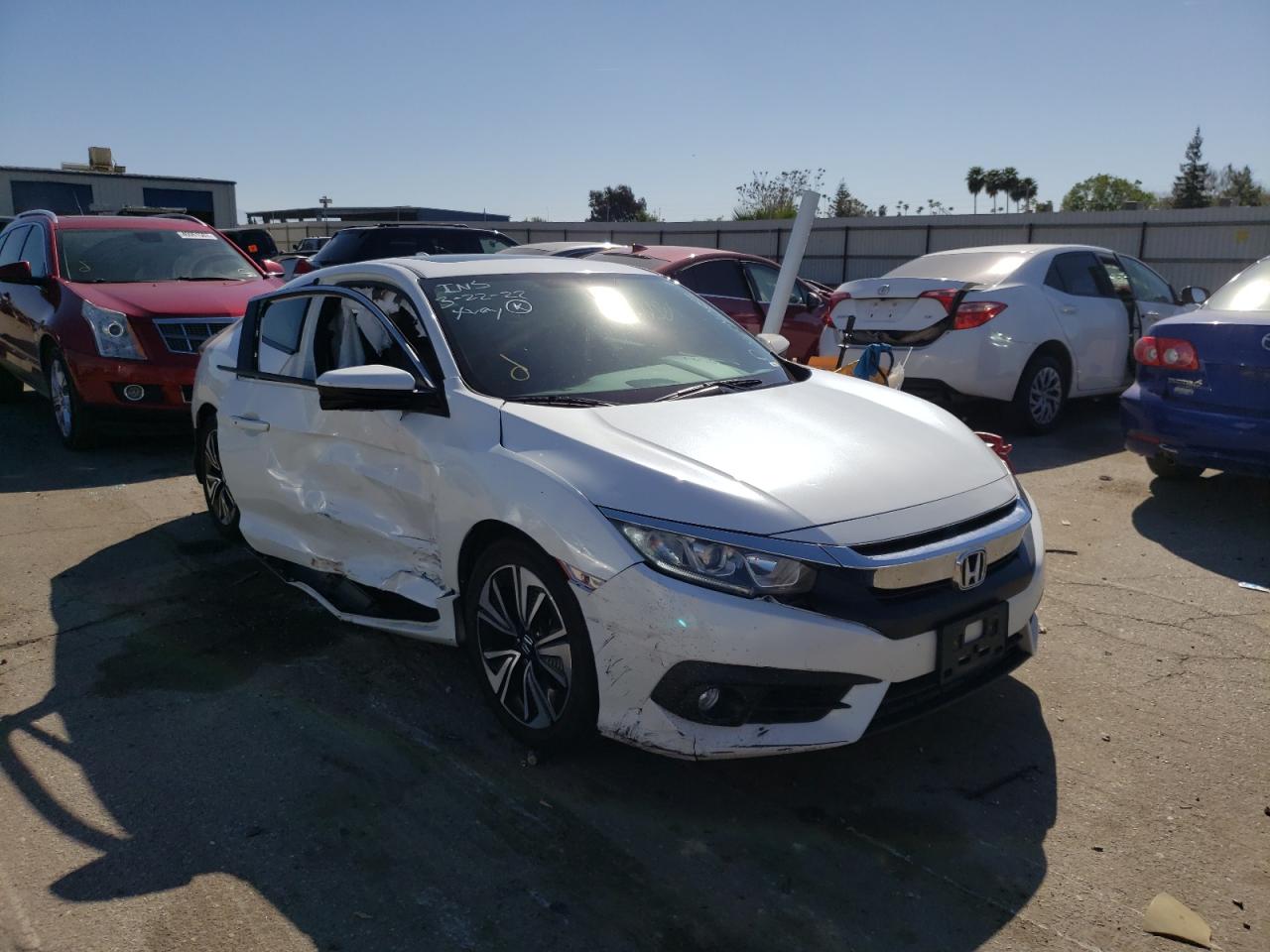 HONDA CIVIC EX 2016 with VIN 2HGFC3B33GH361014 - Photo from auction